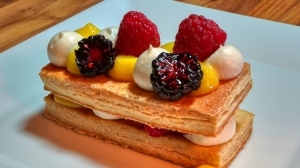 Caramelized Puff Pastry with Cream Cheese Mousse, Lemon, and Fresh Island Berries